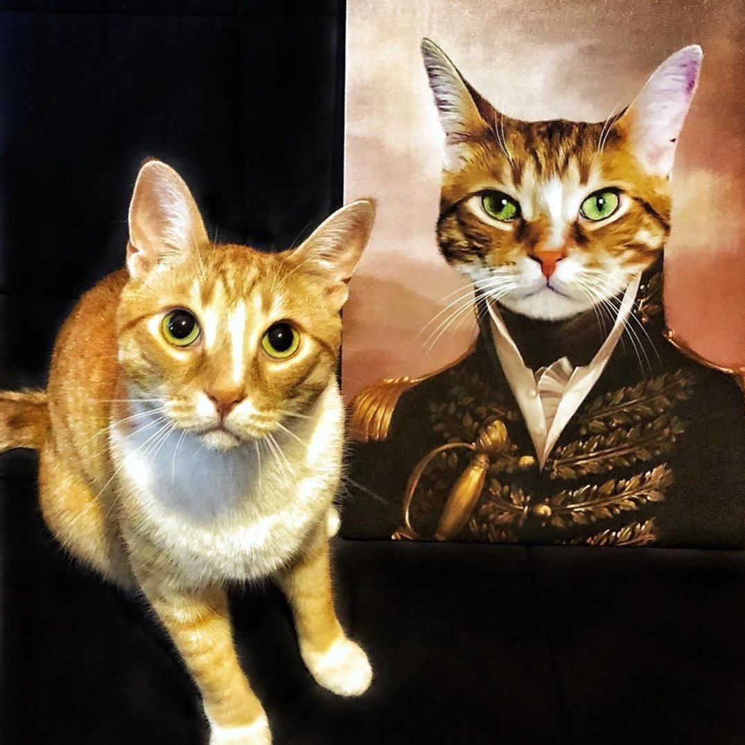 Kleine Katzen neben ihrem Gemälde